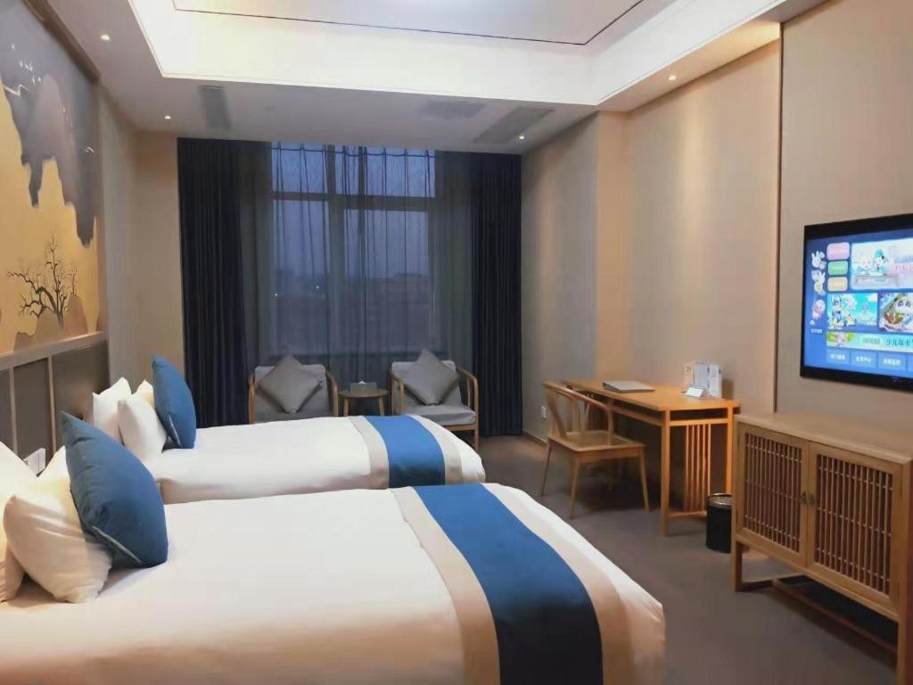 Feicheng Blossom Hotel מראה חיצוני תמונה